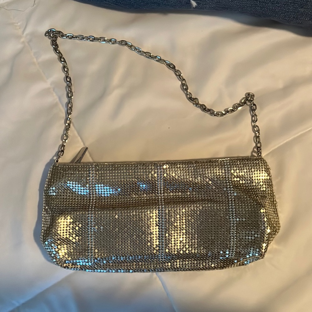 Gold evening bag. Inside zipper. Chain strap.